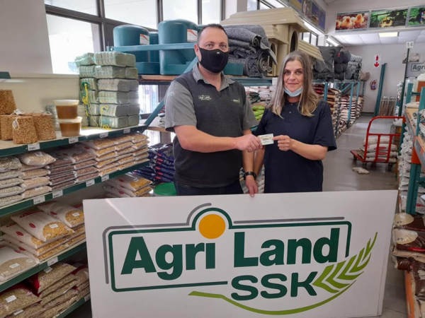 Agri Land SSK George representatives presenting a donation to Global Reboot